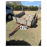 Single Axle Trailer 95inx64in approx.  Wood deck a