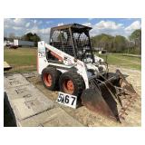 Bobcat Skidsteer Model 753 F Series with 4 in 1 bu