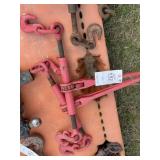 Pair of red ratcheting chain binders