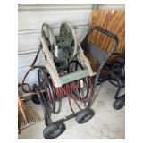 ONE METAL AND ONE PLASTIC HOSE REELS