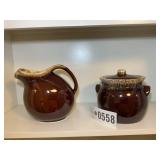 HULL POTTERY, WATER PITCHER AND COOKIE JAR WITH LI