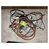 GROUP OF POWER STRIPS AND ELECTRICAL CORDS