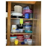 GROUP OF PLASTIC STORAGE CONTAINERS IN UPPER CABIN