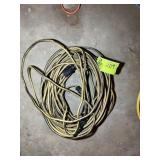 YELLOW EXTENSION CORD, HAS BEEN REPAIRED IN SEVERA