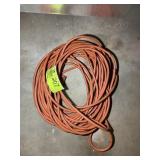 ORANGE EXTENSION CORD, HAS BEEN REPAIRED IN ONE SP