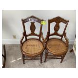 PAIR OF WOODEN RATTAN SEAT CHAIRS, ONE WITH DAMAGE
