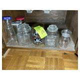 BOTTOM SHELF OF LOWER CABINET LEFT OF OVEN, GROUP