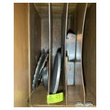 GROUP OF BAKING PANS AND COOKIE SHEETS, ABOVE OVEN