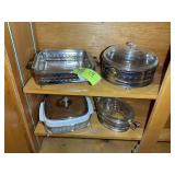 CONTENTS OF FOURTH SHELF LEFT SIDE IN CABINET IN L