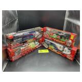 GROUP OF 4 RACING CHAMPIONS 1/64 SCALE TRANSPORTER