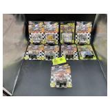 GROUP OF 9 RACING CHAMPIONS 1/64 SCALE DIE CAST RE