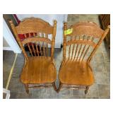 PAIR OF WOODEN PRESSED BACK DINING CHAIRS