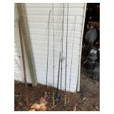 GROUP OF ASSORTED FISHING RODS, SOME WITH REELS