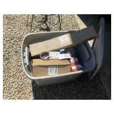 TOTE WITH MISC BOBCAT PARTS, BELTS, FILTERS, ETC