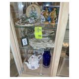 LEFT SIDE BOTTOM OF CHINA CABINET, FIGURINES, TEA