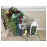 GROUP INCLUDING PLANT STANDS WITH DECORATIVE FLOWE