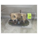 HOMEMADE WOODEN COTTAGE IN PLASTIC DISPLAY CASE, A