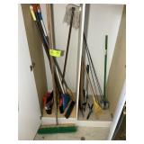 GROUP OF BROOMS AND YARD TOOLS, RAKES