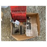 GROUP OF DRILL BITS, AND DRILL GRINDING ATTACHMENT