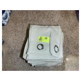 GROUP OF TAN COLOR CURTAINS