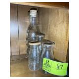 GROUP OF HALF PINT, AND OTHER MILK JARS