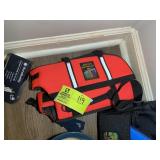 GROUP OF DOG RELATED ITEMS, LIFE JACKET, TRAINING