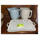 GROUP INCLUDING POTTERY STYLE PITCHERS, AND SERVIN