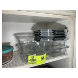 TOP SHELF OF CABINET INCLUDING CLEAR STORAGE GLASS