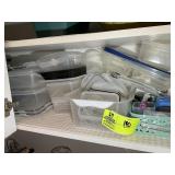 BOTTOM SHELF INCLUDING MISC PLASTIC STORAGE CONTAI