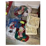 GROUP OF STOCKINGS AND WOODEN HOLIDAY THEMED BOXES