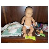 MIDDLE SHELF OF BOOK CASE, CROCHET BABY CLOTHES JA
