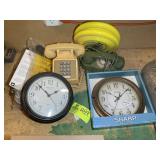 GROUP OF CLOCKS AND PHONES