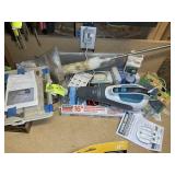 CONTENTS ON TOP OF TABLE, HAND SAW, DUST BUSTER, E