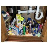 GROUP OF CLEANING ITEMS UNDER SINK