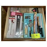 DRAWER WITH CANDLES, THERMOMETERS, KNIVES