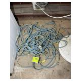 BLUE AND YELLOW EXTENSION CORD, HAS BEEN REPAIRED