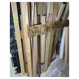 GROUP OF MISC UNPRIMED WOOD TRIM AND 1X MATERIAL