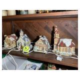 GROUP OF 4 MJ HUMMEL LIGHTED BUILDINGS, ONE BROKEN