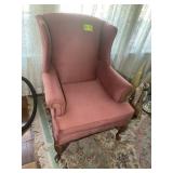 RED UPHOLSTERED WINGBACK ARMCHAIR