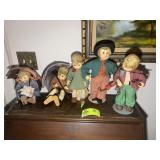 GROUP OF HUMMEL PORCELAIN DOLLS, BOY WITH GREEN PA