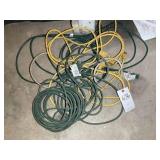 GROUP OF GREEN AND YELLOW EXTENSION CORDS