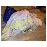 TOTE WITH APPEARS TO BE KING SIZE AFGHAN BEDSPREAD