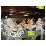 TOP SHELF OF CURIO CABINET, CHRISTMAS THEMED FIGUR