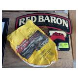 RED BARON PLASTIC SIGN WITH DAMAGE 25' X 17' AND