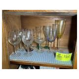 SHELF WITH MISC DRINKING GLASSES AND STEMMED GLASS