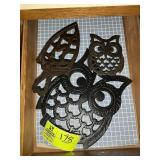 DRAWER WITH MISC CAST IRON TRIVETS, OWLS, ETC