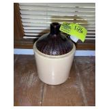 BROWN AND TAN STONEWARE FINGER HOLD JUG, TOP DECOR