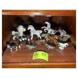 GROUP OF HORSE THEMED FIGURINES