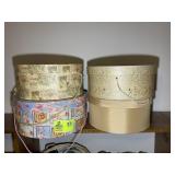 GROUP OF 4 ROUND DECORATIVE BOXES