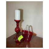 GROUP OF DECORATIVE RED GLASS ITEMS, VASE, CANDLE